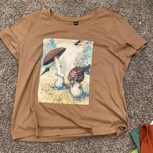 This shirt is great quality but has 2 black paint stains on the front but little